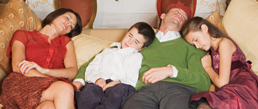 The Turkey Is Not Making You Tired Family sleeping on sofa at Christmas